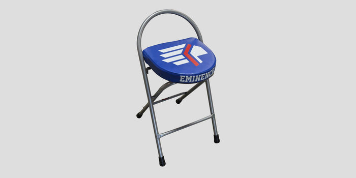 Blue folding stool with white and red logo, "EMINENCE" text.