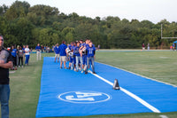 Thumbnail for Royal blue ArmorMesh custom football sideline tarp providing sideline turf protection at Anna Jonesboro field