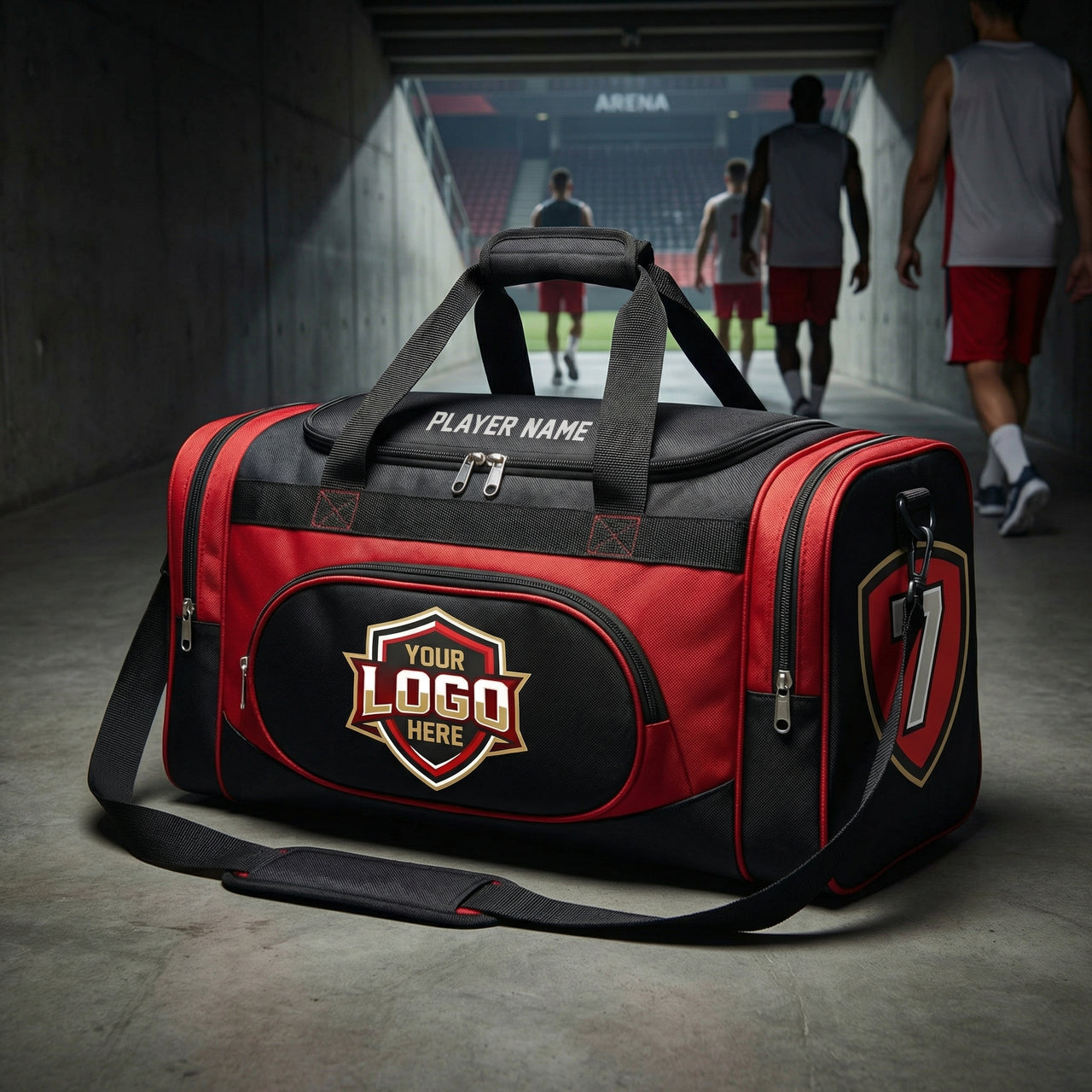 Red and black duffle bag with "YOUR LOGO HERE" and "PLAYER NAME" in a stadium tunnel.