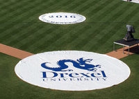 Thumbnail for Custom printed rain spot covers with Drexel University logo on pitching mound and on-deck circle of a college baseball field