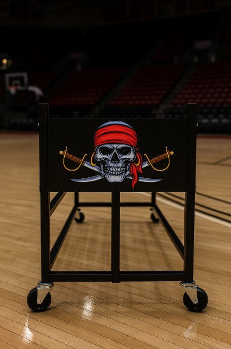 Black ball rack with a pirate skull and crossed swords logo on a gym floor.