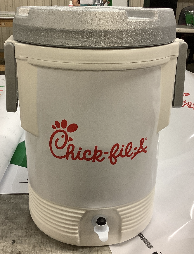 Custom-branded 5-gallon cooler with a unique logo and color scheme for team pride.