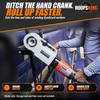 Thumbnail for Person holding a gray and orange electric Power Winder fitted to the pipe of a gym floor cover storage rack