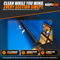 Thumbnail for Black steel-housed nylon brush assembly mounted on a GymGuard storage rack, sweeping debris off a royal blue gym floor cover