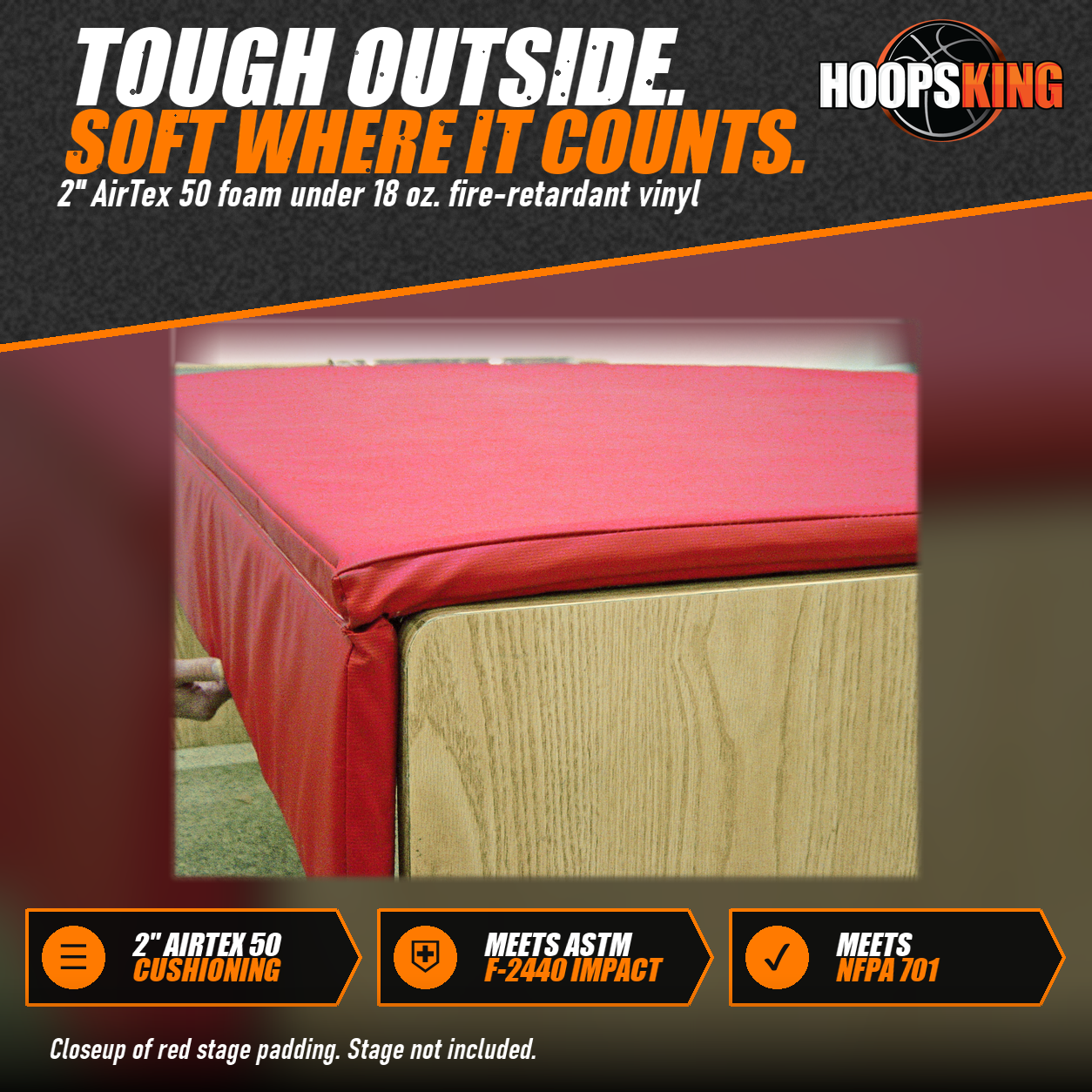 Close-up of red vinyl stage padding covering the top and front corner of a wood-grain stage