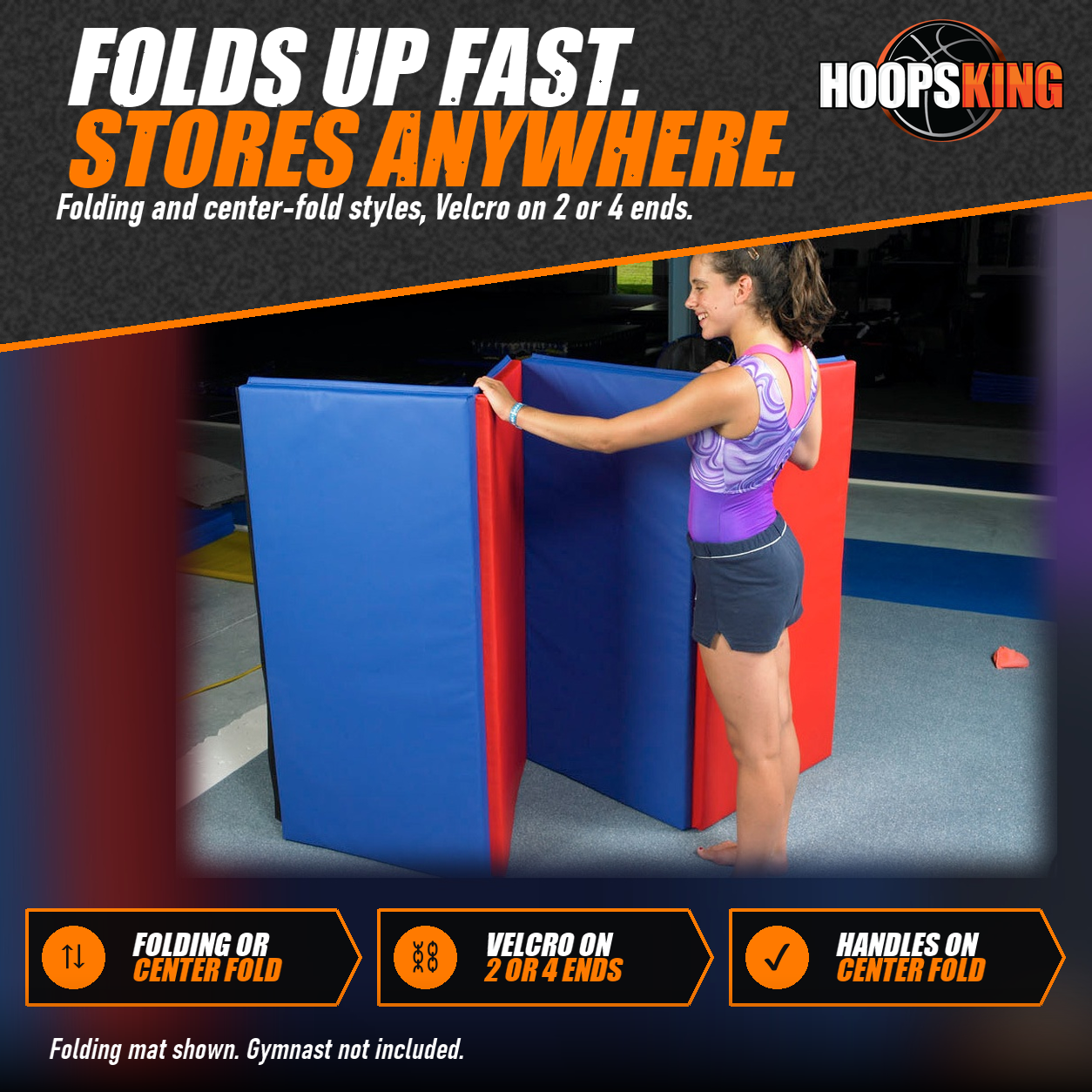 Gymnast in a purple leotard beside blue and red folding mat panels standing upright in a gym