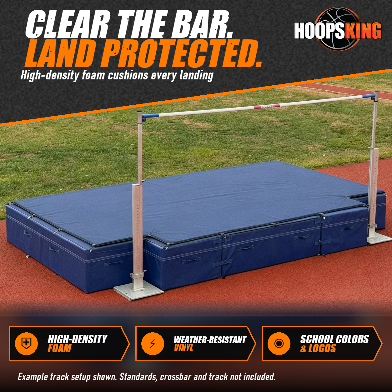 Blue high jump landing mat with silver standards and a crossbar set up on a red track beside empty bleachers