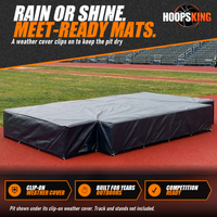 Thumbnail for High jump landing pit wrapped in a dark gray clip-on weather cover on a red running track in front of bleachers
