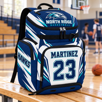 Thumbnail for Custom basketball backpack in navy, white and teal with North Ridge Hawks artwork, Martinez 23 personalization, and separate ball and shoe compartments, shown courtside.
