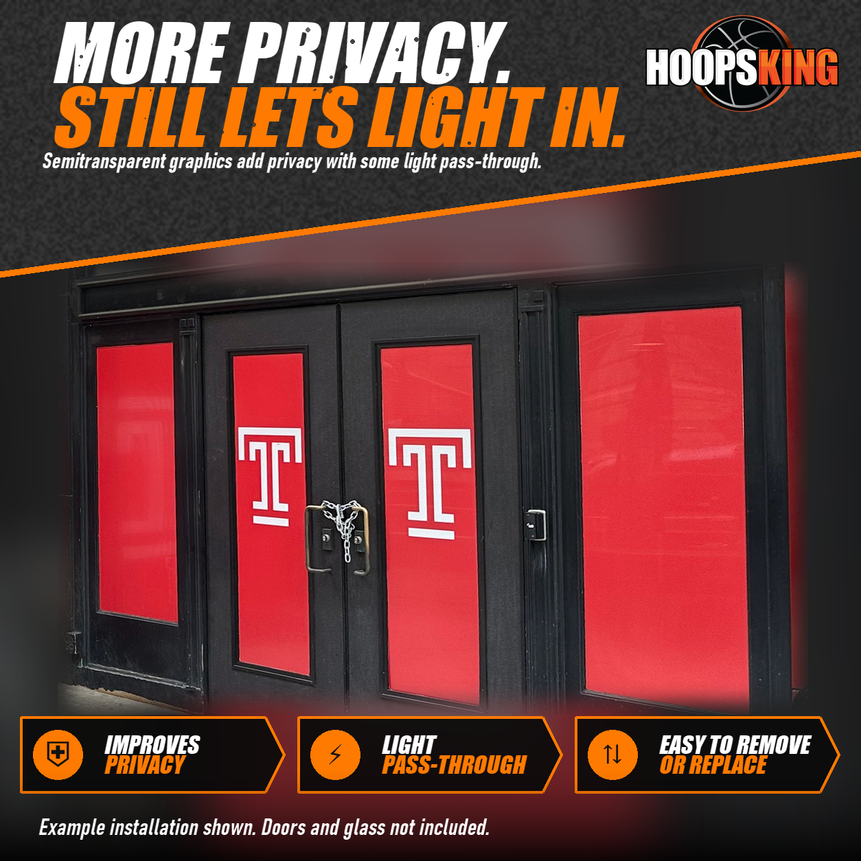 Close view of red perforated vinyl graphics with white T logos applied to glass entry doors and side windows