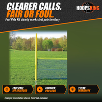 Thumbnail for Yellow Grand Slam foul pole standing at the end of a green portable outfield fence with a yellow top tube on a grass field