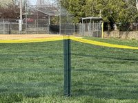Thumbnail for Green portable sports fencing Grand Slam fencing with a yellow top rail used as a baseball and softball outfield fence pocket