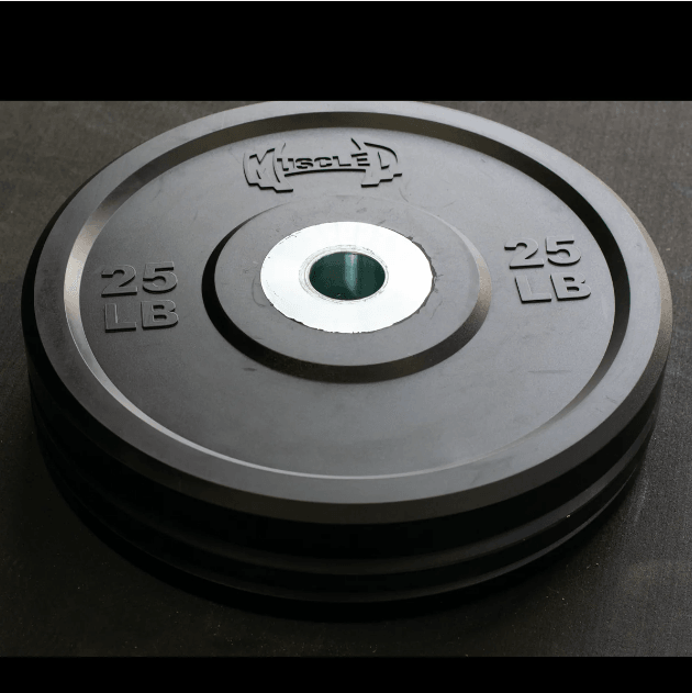 Stack of three black 25lb bumper plates with a silver center ring and "MUSCLE'D" logo.