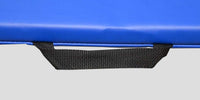 Thumbnail for Close-up of a blue exercise mat with a black fabric carrying handle.
