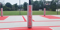 Thumbnail for Grey post pads with red SAINTS lettering on a court