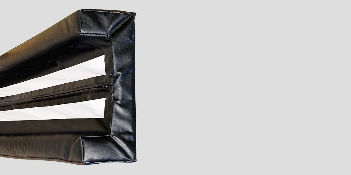 Black I-beam pad with white interior stripes and a zipper closure.