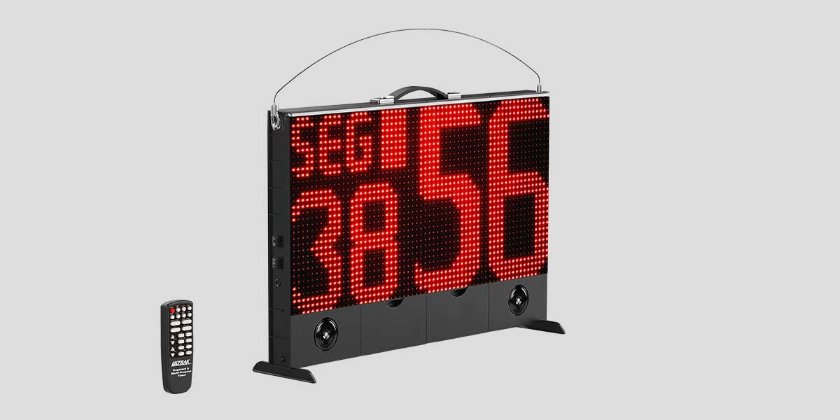 Black segment timer with red LED display showing "SEG 15" and "38.56", with a remote control.