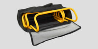 Thumbnail for Yellow speed hurdles stored inside a black carry bag with a mesh pocket.