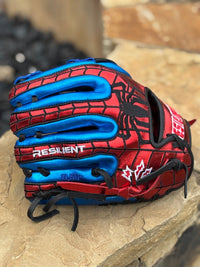 Thumbnail for Red and blue baseball glove with black spider web design, 
