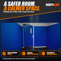 Thumbnail for Small room lined floor to ceiling with royal blue wall padding, including a padded door with a narrow window