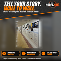 Thumbnail for Long fabric timeline display with photos and a Villanova pennant graphic mounted along a school hallway wall