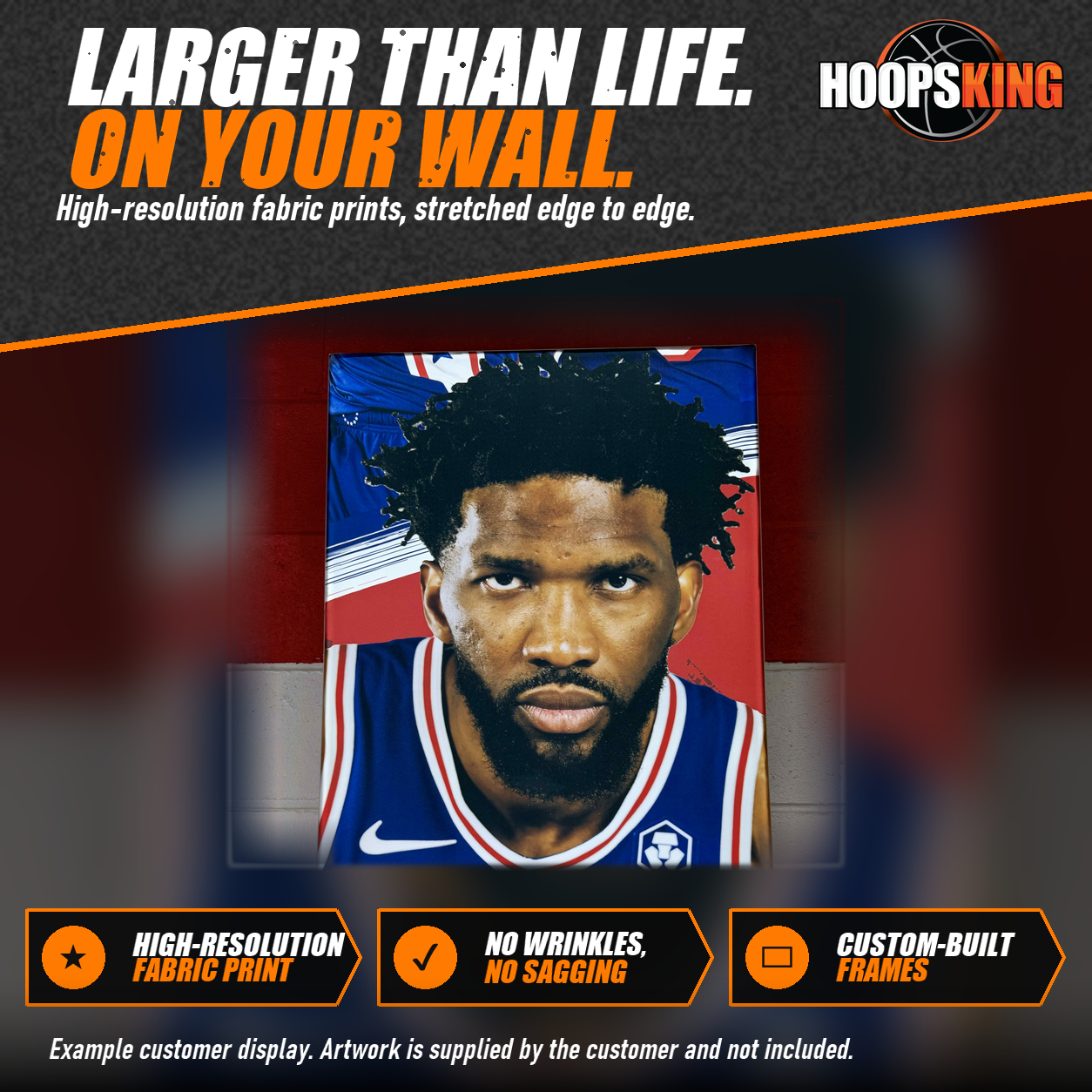 Silicone edge fabric display printed with a large portrait of a basketball player in a blue jersey, mounted on a red and gray gym wall