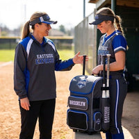 Thumbnail for Softball coach and player with an Eastside Express custom wheeled bat backpack