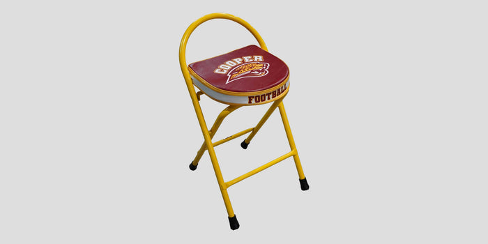 Yellow folding stool with a maroon seat featuring "COOPER FOOTBALL" logo.