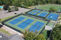 Thumbnail for Aerial view of tennis courts surrounded by custom printed privacy screens featuring facility branding at The Courts at Liberty Park in North Caldwell