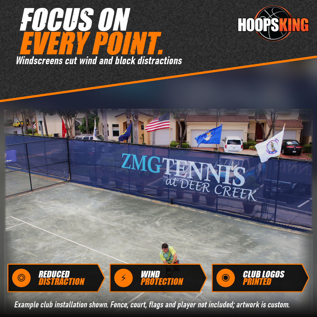 Navy tennis fence windscreen printed with ZMG Tennis at Deer Creek behind a player hitting a backhand on a clay court