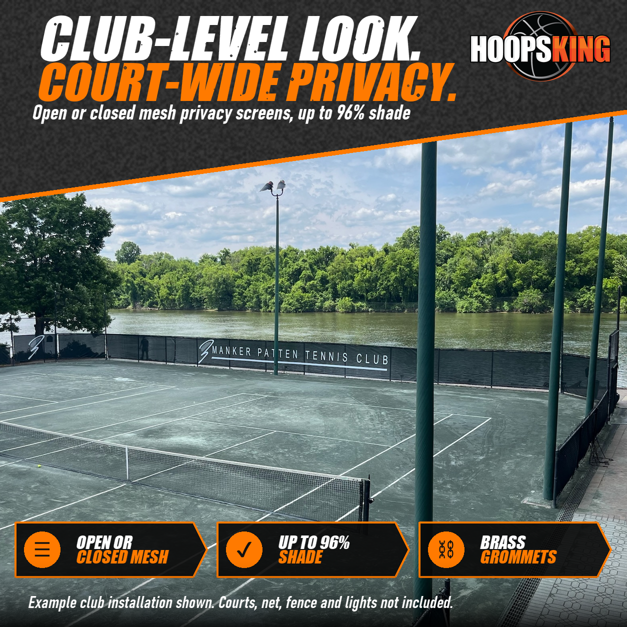 Black mesh tennis windscreen printed with the Manker Patten Tennis Club logo along a riverside clay court fence