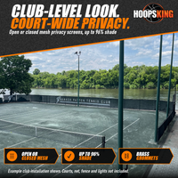 Thumbnail for Black mesh tennis windscreen printed with the Manker Patten Tennis Club logo along a riverside clay court fence