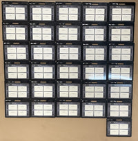Thumbnail for Grid of 35 custom pro football whiteboards with handles, each labeled with a different coach's name.