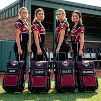 Thumbnail for Valley Heat softball players with matching custom rolling bat bags and player names