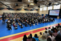 Thumbnail for Royal blue vinyl gym floor covering deployed on basketball court gymnasium protecting hardwood floor