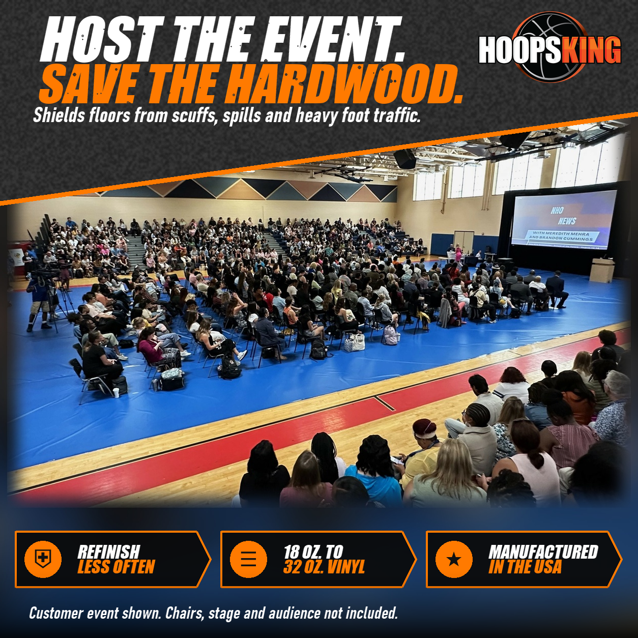 Royal blue GymGuard vinyl floor cover protecting a gym floor under rows of seated attendees facing a presentation screen