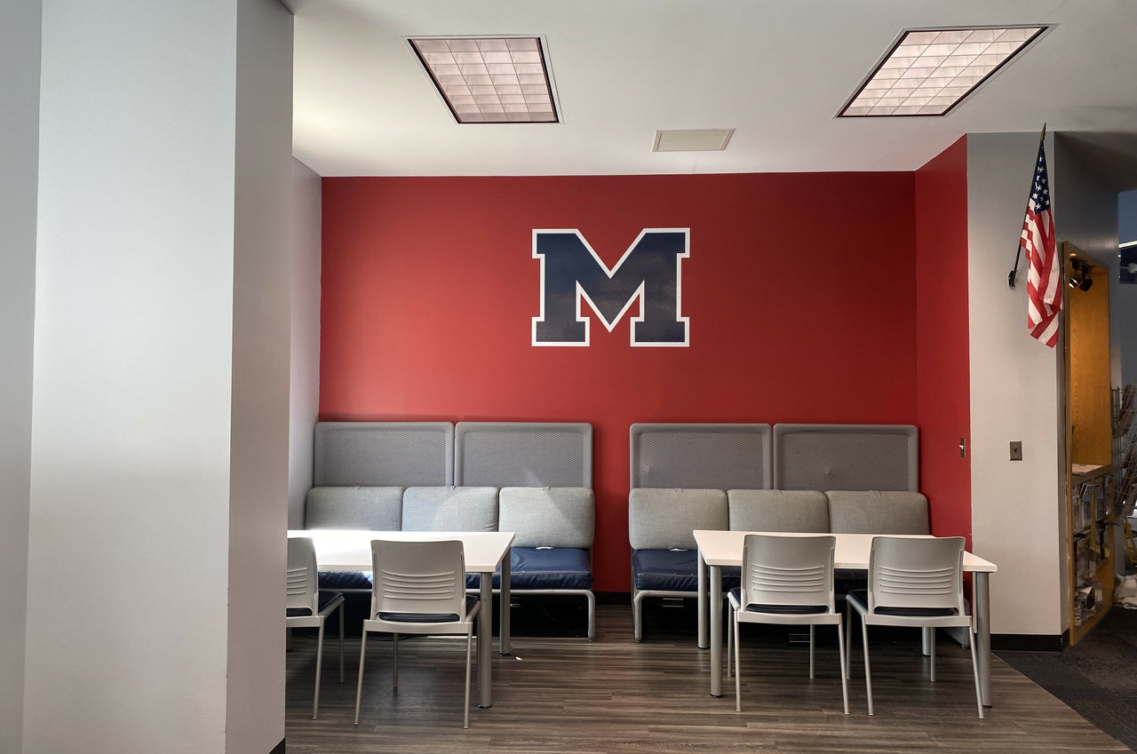 School facility wall graphics with custom lettering and team branding