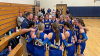 Thumbnail for Wave girls basketball team in royal blue and gold custom arm sleeves in a huddle