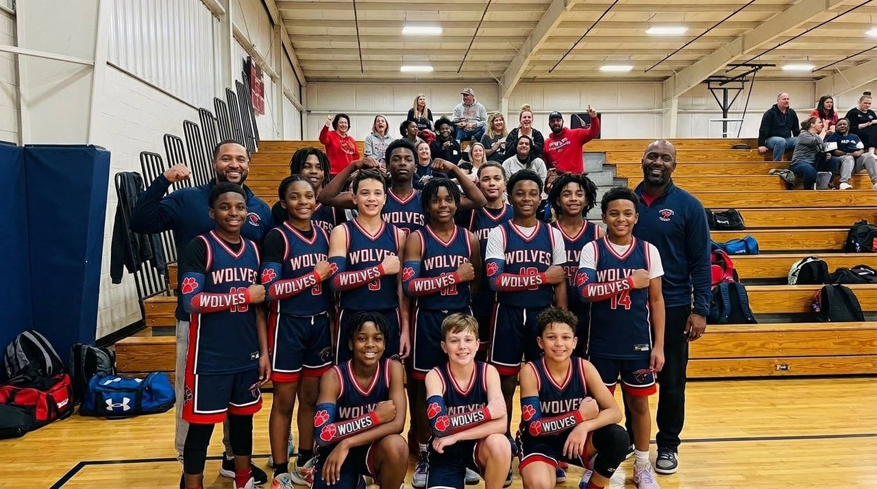 Youth basketball team in navy and red Wolves custom arm sleeves