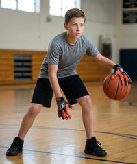 Thumbnail for Youth player dribbling with Hoop Handz weighted gloves