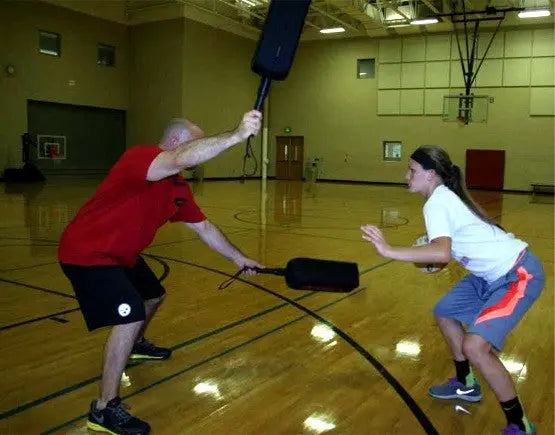 What are you going to do?  Shot and drive are both challenged.  This is were players start to learn how important it is to move the defense with jabs and fakes.  If you don't learn to use those you will never beat a taller, longer, and more athletic player.