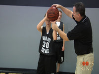 Thumbnail for how to teach a child to shoot a basketball