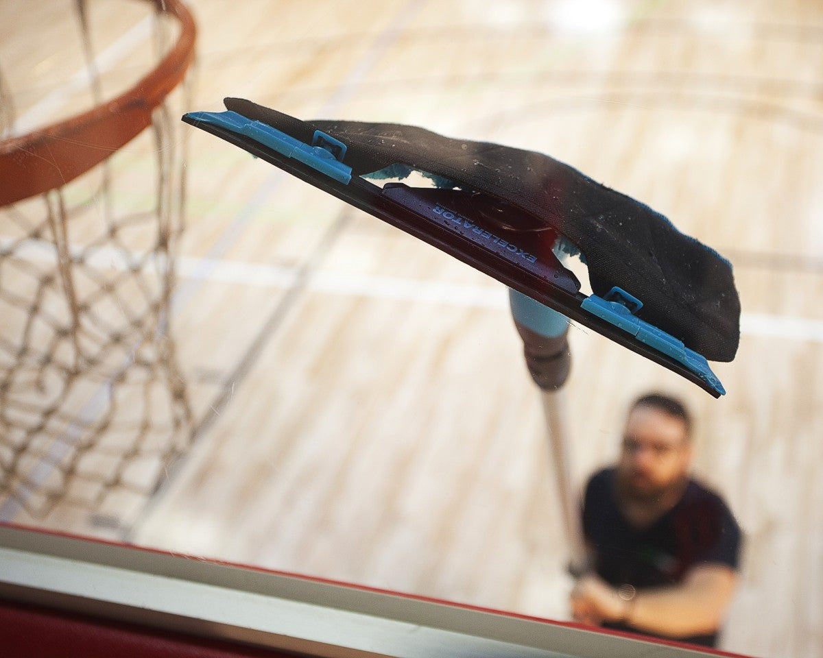 squeegee to wipe away water and leave backboard without streaks