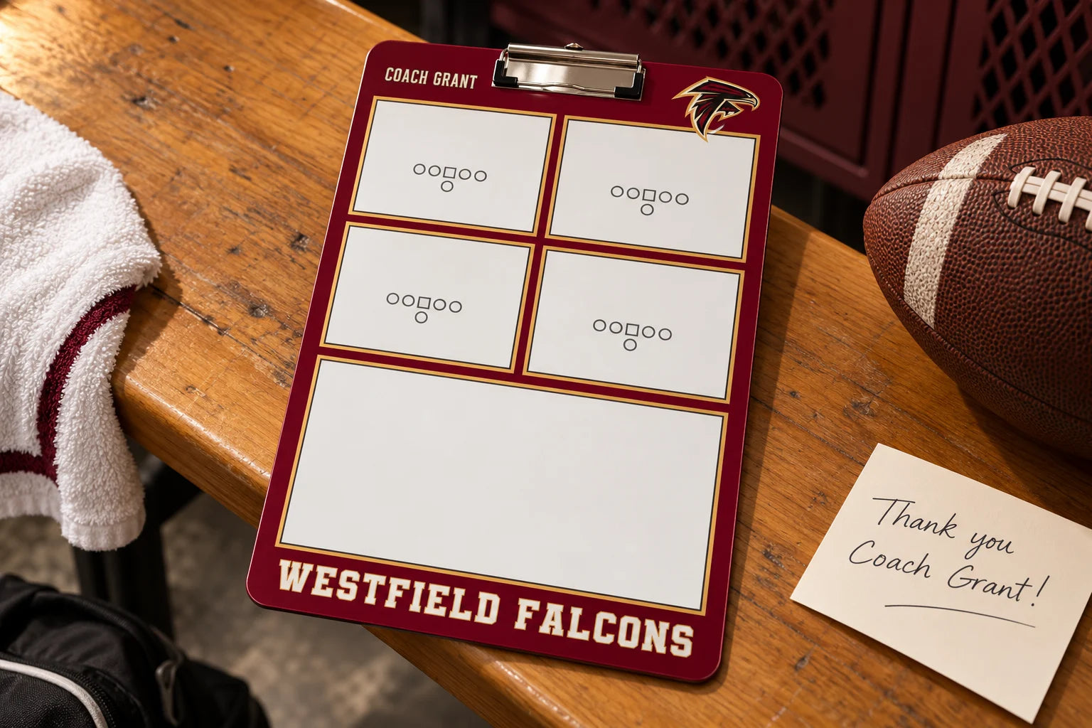 Illustrative burgundy Westfield Falcons clipboard personalized for Coach Grant, beside a football and thank-you card